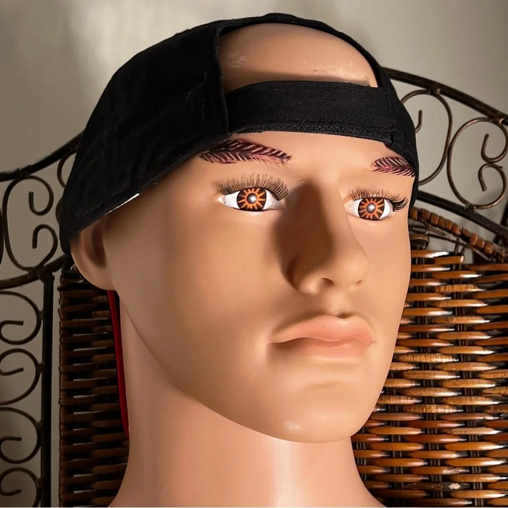 A one size fits all Black ball Cap 